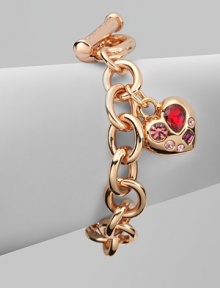 A warm rose goldtone style with colorful rhinestone accented heart-shaped charm on a link chain. Rose goldtone brassGlass stonesLength, about 7½Toggle closureImported 