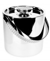 Engraved for timeless style in stainless steel and silver plate, the Watchband double-walled ice bucket and tongs from Lauren Ralph Lauren add sleek polish to the home bar.