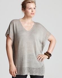 Intricate knit lace lends feminine appeal to a breezy Eileen Fisher Plus tunic. Balance the boxy silhouette with sleek separates for effortless sophistication.