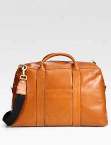 Classic leather duffel silhouette in Mill Leather fabrication, perfect for weekend or business trips.Zip closureDouble top handlesRemovable shoulder strapExterior patch pocketInterior zip pocketLeather12W x 20H x 9DImported