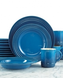 The dinnerware set that has it all. Crafted for durability and ease of use but with a brilliant enamel finish to redefine the table, Le Creuset place settings lend smart, enduring style to everyday dining. Featuring a three-ring design in vibrant aqua.