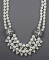 Any leading lady will take center stage while wearing Givenchy's showstopping drama necklace. Made with glass pearls and dazzling crystals in silver tone mixed metal. Approximate length: 18 inches + 2-inch extender. Approximate drop: 3-1/2 inches.