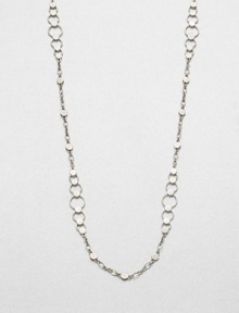 From the Dot Collection. This nature-inspired style from a socially and environmentally responsible brand features a sterling silver dot and hoop chain in a graduating design. Sterling silverLength, about 36Lobster clasp closureImported