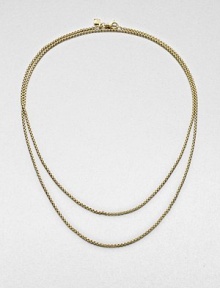 A baby box chain necklace in radiant 18k gold. 18k goldLength, about 32Lobster clasp closureImported 