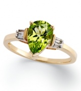 An elegant accent piece in your favorite hue. This exquisite ring features a pear-cut peridot (1-3/8 ct. t.w.) and round-cut diamond accents at the sides. Set in 14k gold.