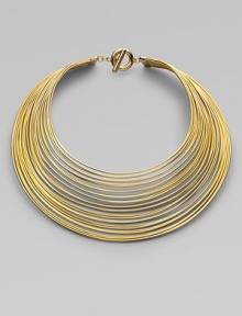 Totally simple and totally fabulous, this striking collar is gracefully formed of delicate brass wires with a polished finish.BrassLength, about 16Drop, about 8Toggle closeImported