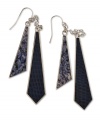 Add an edge to your party look with these earrings from GUESS. The navy and blue snake texture on the double-drop silhouette amps up your night. Crafted in silver tone mixed metal. Approximate drop: 3-1/2 inches.