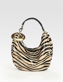 Bold zebra stripes highlight this slouchy silhouette of lustrous patent leather.Top handle, 7½ dropTop zip closureOne inside zip pocketOne inside open pocketSuede lining14W X 10H X 4½DMade in Italy