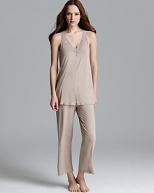 Lounge around in style with a soft V-neck tank and matching capri pants from Midnight by Carole Hochman.