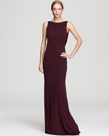 A draped, low back makes a stunning exit on this ABS by Allen Schwartz gown, rich in a deep, wine hue.