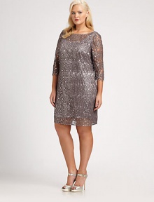 You'll shimmer and shine in this stunning lace dress featuring an ultra-feminine neckline and elbow-length sleeves for chic arm coverage. Round neckElbow-length sleevesFully linedBack zipperAbout 24 from natural waistMetallic thread/polyesterDry cleanImported