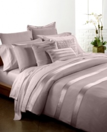 The Essentials Dusk quilt from Donna Karan adds elegance and comfort to your bed with perfectly tailored puckered stitch details.