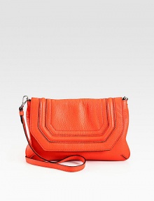 Supple pebble grain leather in a vivid hue forms this flap-front silhouette, with a detachable shoulder strap for added versatility. Detachable shoulder strap, 19½ dropMagnetic snap closure on front flapOne outside back zip pocketOne inside zip pocketTwo inside open pocketsFully lined13W X 8H X 1½DImported