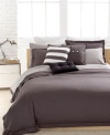 Clean, casual & comfortable. The Solid Grey Brushed Twill duvet cover set from Lacoste is essential to any well-dressed bed. Brushed twill fabric and over-sized buttoned accents create a classic, preppy look. Button closure.