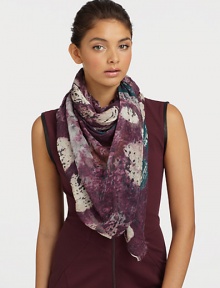 A palette of rich hues defines this elegant scarf, rendered in modal and cashmere and finished with eyelash fringe.90% modal/10% cashmereAbout 55 X 73Dry cleanImported