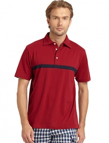 THE LOOKPolo collarFront button placketShort sleevesContrast stripe accentVented shirttail hemTHE MATERIALCottonCARE & ORIGINMachine washImportedThis item was originally available for purchase at Saks Fifth Avenue OFF 5TH stores. 