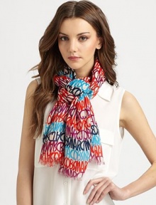 This colorful style features bands of logo stripes and delicate eyelash-fringed edges.Modal47 X 67Dry cleanImported