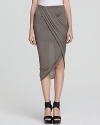 This ultra-soft Helmut Lang skirt wraps and drapes across your silhouette for a unique and truly modern look this season. Lending fashion authority to your days and nights, this piece is one you simply have to own.