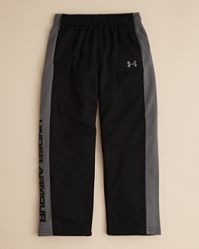 Performance pants with contrast mesh side panels and Under Armour's logo lettering at the cuff.