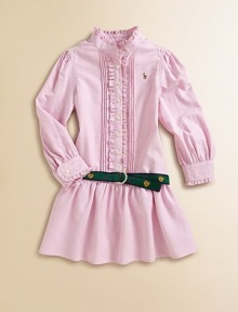 A classic oxford shirt is transformed into a precious dress with ruffled trim, pretty pintucks and gently puffed sleeves.Mockneck with ruffled trimLong, gently puffed sleevesButton-frontDrop-waist with removable ribbon beltA-line skirtCottonMachine washImported Please note: Number of buttons may vary depending on size ordered. 