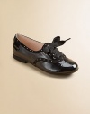 This lustrous patent leather style combines elegance and fun, with dotted trim, wingtip-look perforations and wide grosgrain ribbon laces that tie in pretty bows.Lace-up frontLeather upperLeather solePadded insoleImported