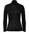 Sleek long sleeved top in black rayon and wool - Wonderfully soft and comfortable - Narrow silhouette with feminine turtleneck and short zip at the nape - A favorite basic perfect for layering or wearing solo - Team with skinny jeans, narrow skirts or wide-legged pants