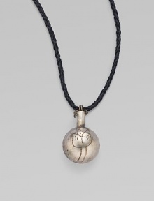 An etched metal sphere with a weathered, antique look hangs from a rich strap of braided buffalo leather in this spirited yet simple piece.Metal Leather Length, about 24 Imported