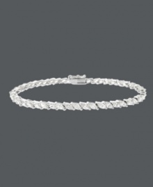 Exemplify elegance. This stunning tennis bracelet by B. Brilliant highlights sparkling, marquise-cut cubic zirconias (7-1/5 ct. t.w.) set in sterling silver. Approximate length: 7-1/4 inches.