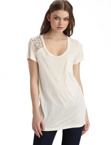 The classic pocket tee gets a glamorous update with a chiffon inset on one shoulder, embellished with chunky beads and chains.Scoopneck Single embellished shoulder Pullover style Short sleeves Chest welt pocket About 26¾ from shoulder to hem Rayon; hand wash Imported