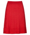 Colorblock your look with a chic feminine edge in Missoni Ms characteristic textural knit red skirt - Flat elasticized waistband, contrast patterned border around hemline, nude satin lining - Fitted waist, flared silhouette - Wear with a bright knit top and sophisticated heels