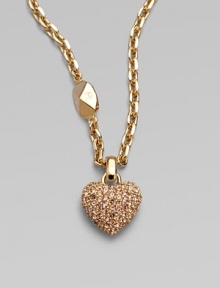 Be brilliant in this dazzling crystal encrusted heart pendant on a logo accented link chain. Palladium plated or goldtoneCrystalsLength, about 14Pendant size, about ½Spring ring closureImported