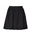 Stylish skirt of fine, black synthetic fiber - Elegant floral applique - Feminine A-line silhouette that moves into beautiful, soft folds - Sexy mini length - Gorgeous for evening events with a silk blouse and blazer or biker jacket and heels