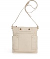 Compact but undeniably chic, this neutral leather crossbody bag highlights the must-emulate trends of the season - Small rectangular shape, top zip closure, long shoulder strap, front logo detail, patched side panels with gold-tone grommets - Wear with an elevated jeans-and-tee ensemble or with a casual cocktail look