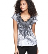 Add a little sizzle to your wardrobe with One World's embellished top! Pair with jeans for a relaxed, chic look.