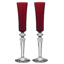 Inspired by the tale of 1001 Nights, this regal set of flutes was designed for Baccarat by Mathias. Richly hued with Venetian cuts, it reflects the light brilliantly.