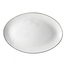 For nearly 150 years, Bernardaud has produced extraordinary Limoge porcelain creations. No exception, this fine china serveware features a subtle birch tree rendered in white on white. The result is an elegant, delicate collection of formal dinnerware.