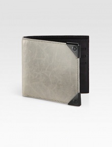 Crafted from lightly distressed lambskin leather, this sleek wallet features ample storage and the look of a well-worn favorite.One billfold compartmentSix card slotsLambskin5W x 4HImported