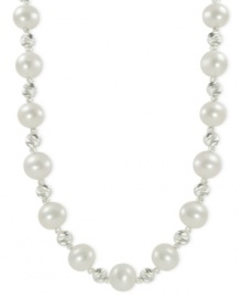 Cultured freshwater pearls (8-8-1/2 mm) blend with rhodium-plated sparkle beads on this sterling silver necklace as the classic look gets a contemporary touch. Approximate length: 18 inches.