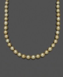 Like drops of gold washed onto the beach, this extraordinary pearl necklace features oval-shaped south sea pearls (10-12 mm) set in 14k gold. Approximate length: 18 inches.