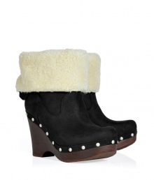 Show off your impeccable style while maintaining warmth and comfort in these wedge clogs with a cozy shearling cuff from UGG Australia - Round toe, platform, wooden wedge heel, stud-detailed trim, contrasting shearling cuff, adjustable back with D-ring buckle - Pair with skinny jeans, an oversized cashmere sweater, and a down jacket or wool cape