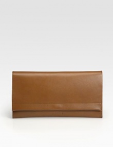 A sleek envelope bag crafted from rich, butter-smooth leather.Flap snap closure9½W X 6H X 1½DMade in Italy