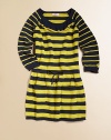 Sweet stripes in sweater-soft knit, detailed with a ruffle at the neck, rolled hems and patch pockets.Round banded neckline with ruffleLong raglan sleeves with ribbed and rolled cuffs, one with Juicy logoSlightly dropped waist with stitched bowPatch pocketsRibbed and rolled hemPullover styling60% cotton/30% nylon/10% angoraMachine washImported