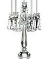 Truly stunning, the Old Vienna candelabra brings the opulence of ages past to today's most elegant interiors. A faceted crystal base and curved arms dangling with glistening crystal beads will become the focal point of any setting. From Lighting by Design.