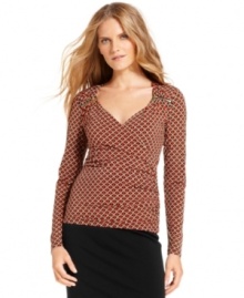 Edgy exposed zippers temper the all-out femininity of a jersey faux-wrap top from MICHAEL Michael Kors.