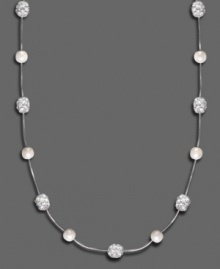 Dress up your day wear or sparkle in the evening: this gorgeous fireball necklace by Monet features glass pearls & pave crystal accents set in shining silvertone mixed metal. Approximate length: 16-18 inches.