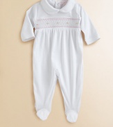 This angelic one-piece is crafted in plush pima cotton and embellished with eye-catching smocking and scalloping for sweet baby style.Peter Pan collarLong sleevesBack snapsBottom snapsPima cottonMachine washImported Please note: Number of snaps may vary depending on size ordered. 