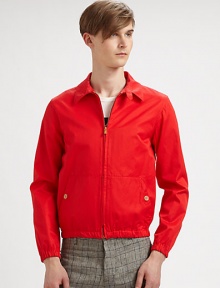 A relaxed, blouson fit, in a vibrant hue is rendered in lightweight cotton for instant modern-day style.Zip frontButtoned kangaroo pocketsAbout 25 from shoulder to hemCottonMachine washImported