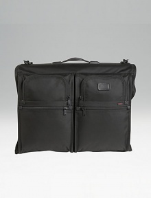 Tumi's original garment bag design, still sought after by business travelers. Universal hanger bracket for any hanger type Specially shaped pockets for shoes, accessories, belts and hair dryers Top carry handle and removable shoulder strap Add-a-bag sleeve lets it ride on wheeled cases Tumi Tracer Protection Ballistic nylon Imported 18H X 23½W X 5½D