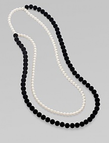 From the Night Blue Collection. This high contrast piece features strands of flocked velvet beads and pearlized glass beads. Length, about 45½ Slip-on style Imported 