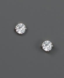 Simple glam to spice up your look. Chic stud earrings by Givenchy feature round-cut cubic zirconias (3/4 ct. t.w.) in silver tone mixed metal.